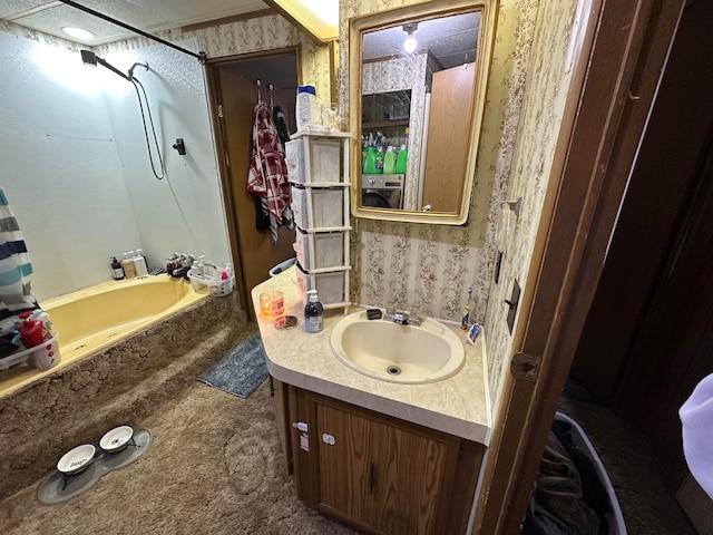 bathroom with shower / bath combo, ornamental molding, and vanity