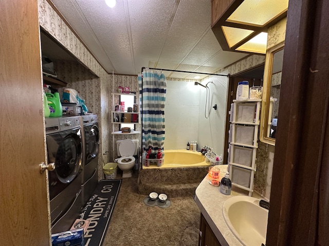 full bathroom with shower / bath combo, vanity, toilet, a textured ceiling, and washing machine and clothes dryer