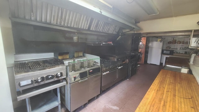 kitchen featuring white refrigerator