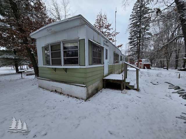 view of snow covered property