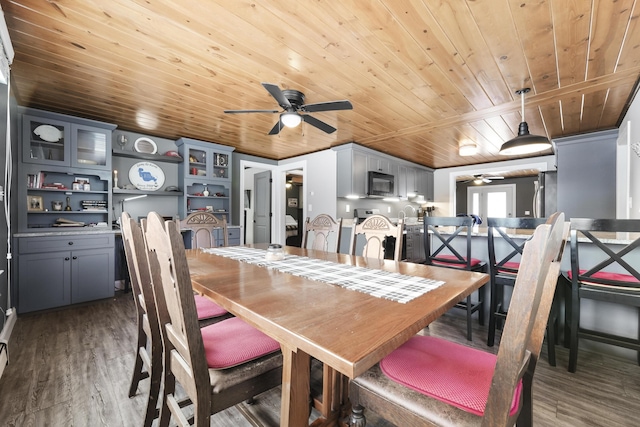 dining area with hardwood / wood-style floors, ceiling fan, and wood ceiling