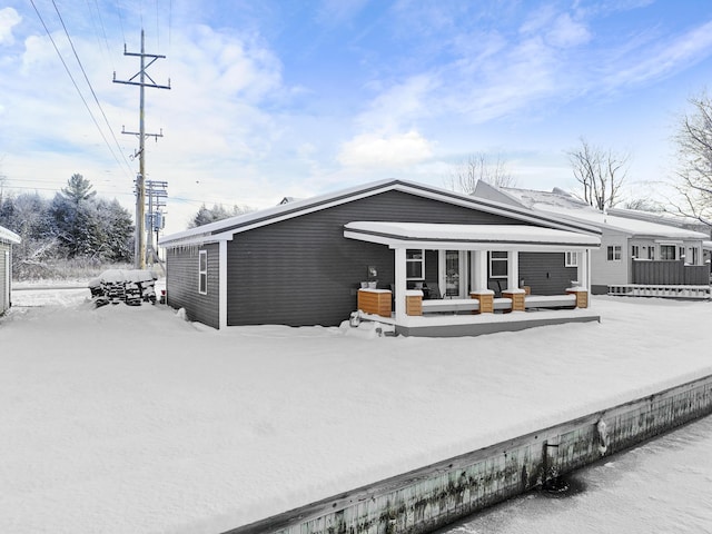 view of snow covered property