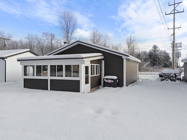 exterior space with a sunroom