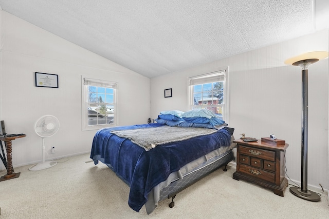 bedroom featuring carpet, vaulted ceiling, and multiple windows