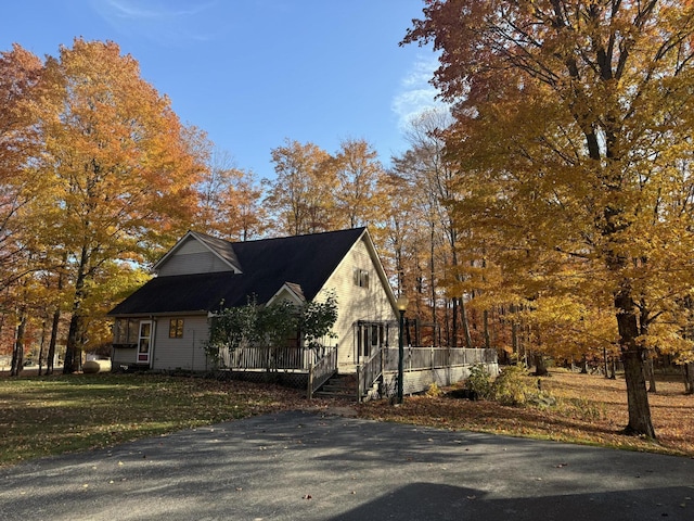 view of property exterior featuring a yard