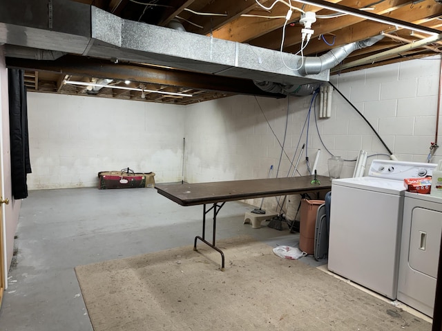 basement featuring washing machine and dryer