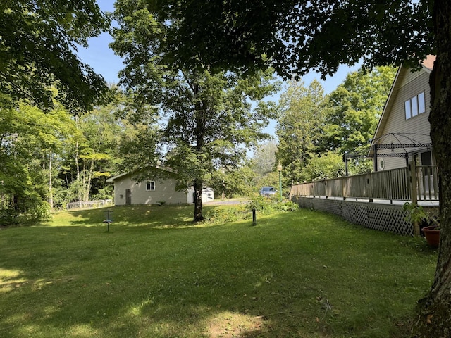 view of yard with a deck