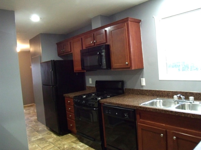 kitchen featuring black appliances and sink