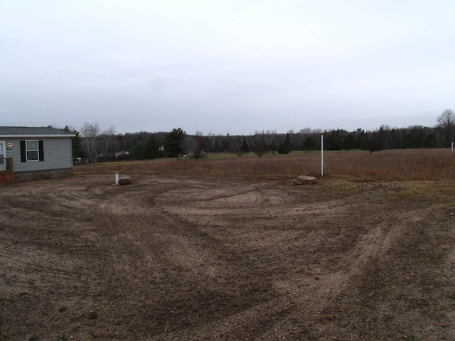 view of yard featuring a rural view