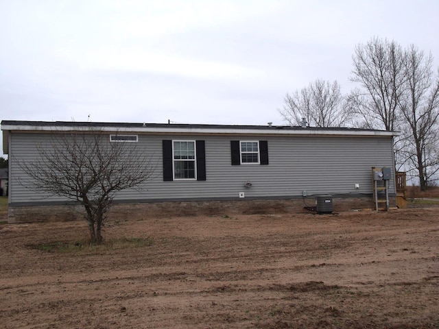 view of home's exterior with cooling unit