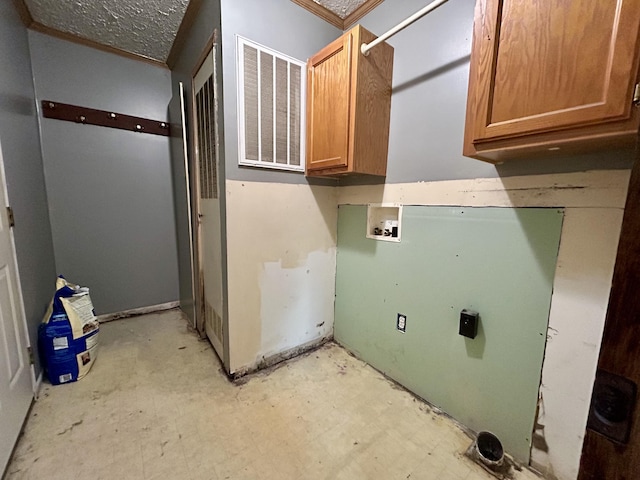 laundry room with cabinets and washer hookup