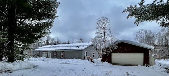 ranch-style home with a garage