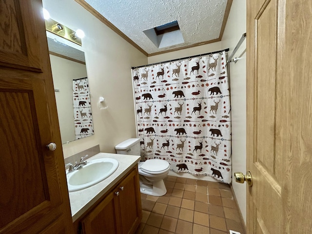 bathroom featuring tile patterned floors, ornamental molding, vanity, a textured ceiling, and toilet