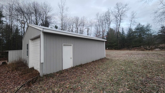 view of outbuilding featuring a garage