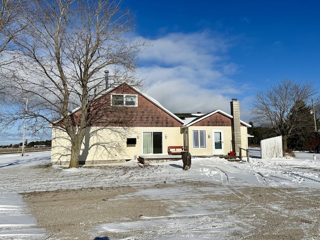 view of snow covered property