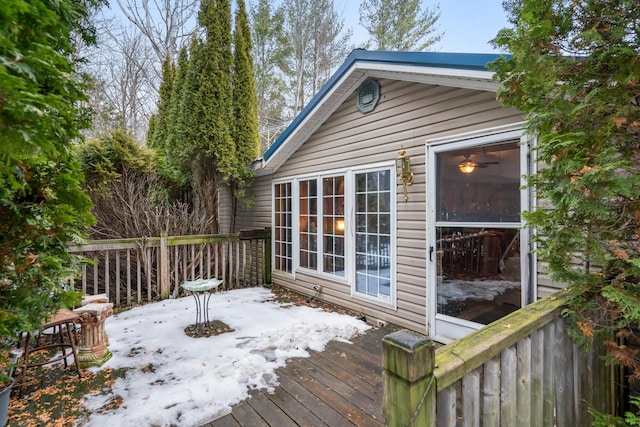 view of snow covered deck