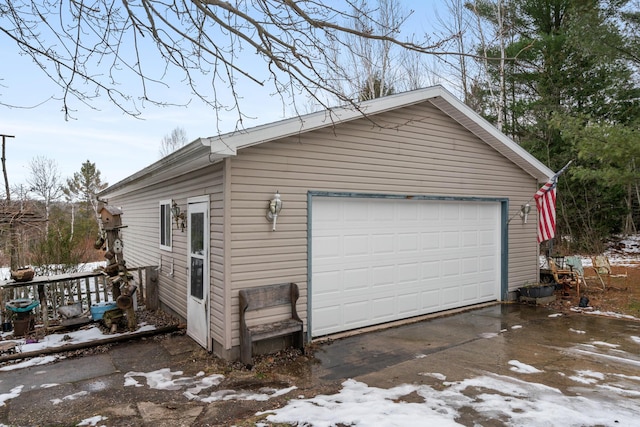 view of snow covered garage