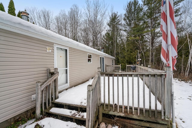 view of snow covered deck