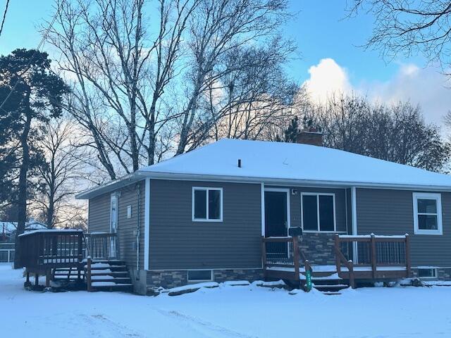 view of snow covered property