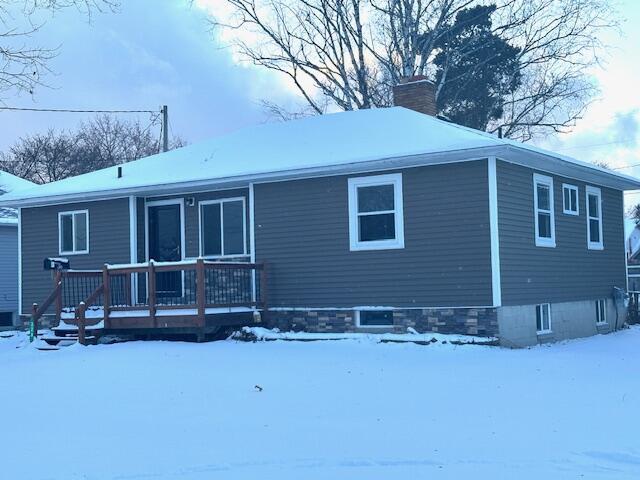 view of snow covered property