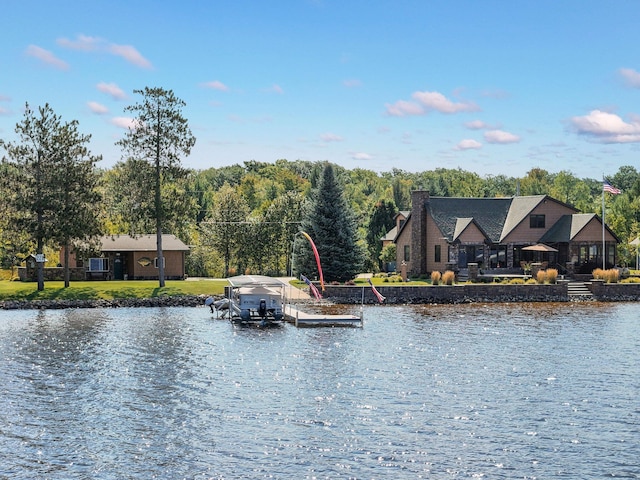 view of water feature with a dock