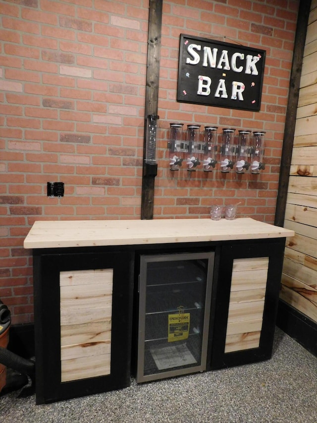 bar with carpet and beverage cooler