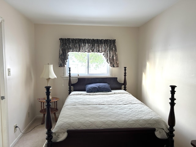 bedroom featuring carpet