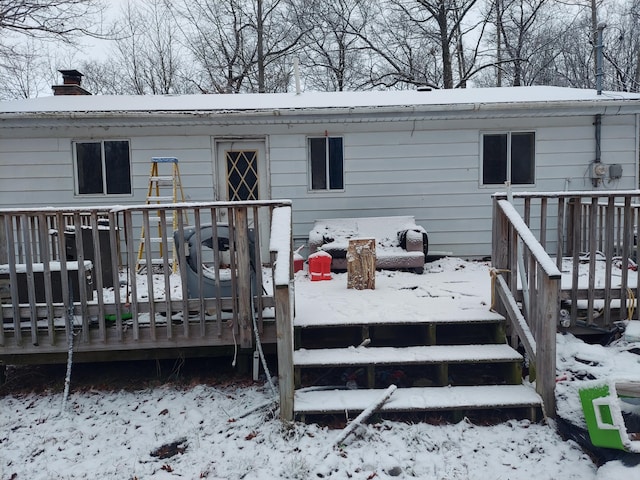 view of snow covered deck