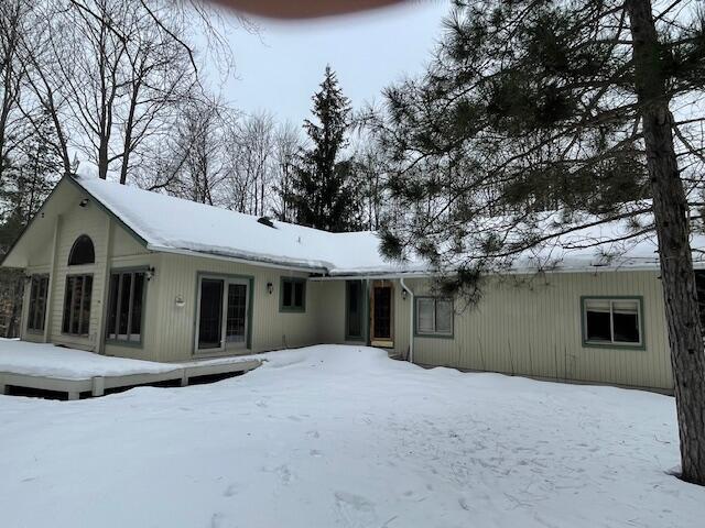 view of snow covered property