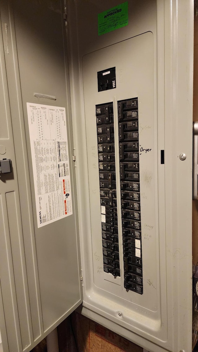 utility room featuring electric panel