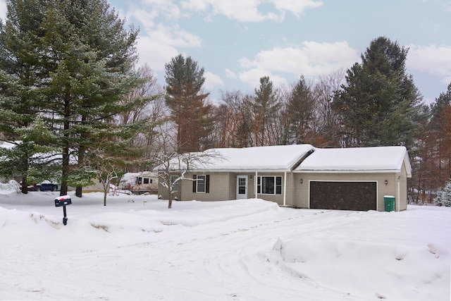 ranch-style home with a garage