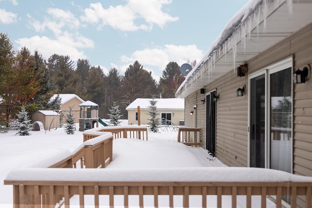 view of snow covered deck