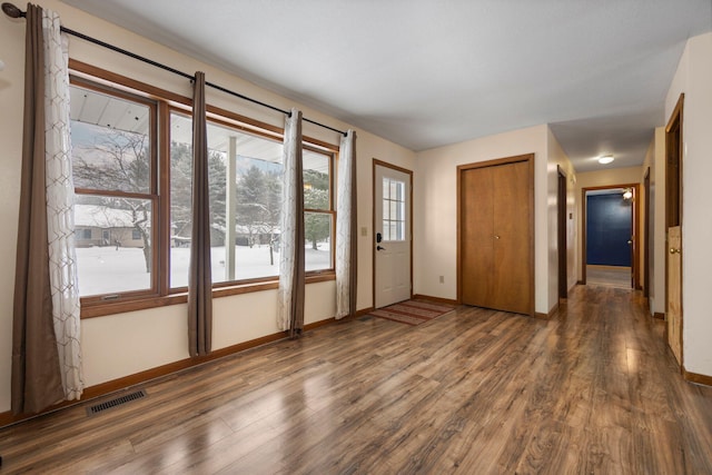 interior space featuring dark wood-type flooring