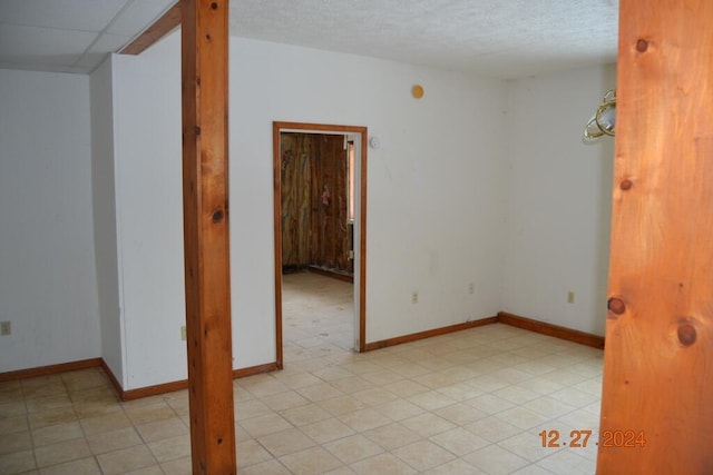 empty room with a textured ceiling