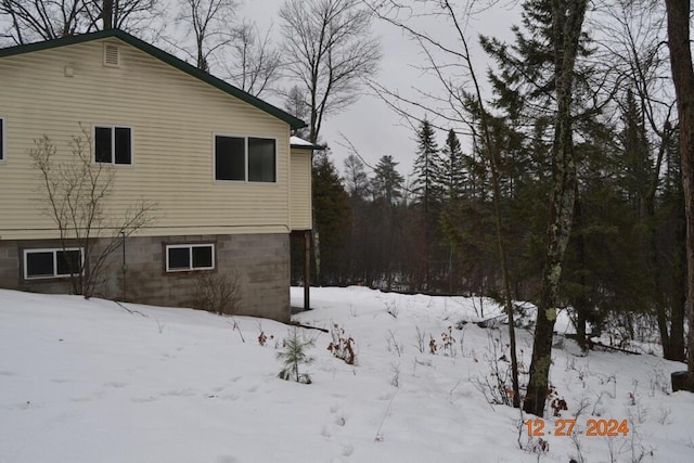 view of snow covered property