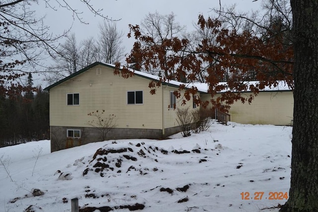 view of snow covered property