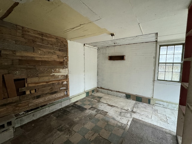 empty room with wood walls