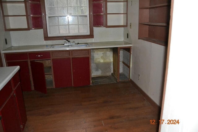 kitchen featuring dark hardwood / wood-style floors and sink