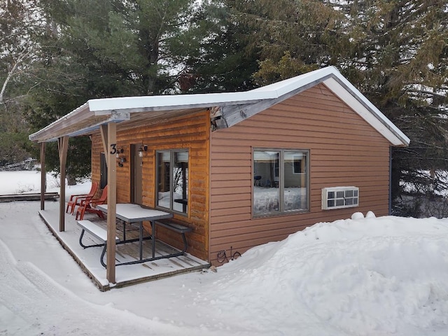 view of snow covered property