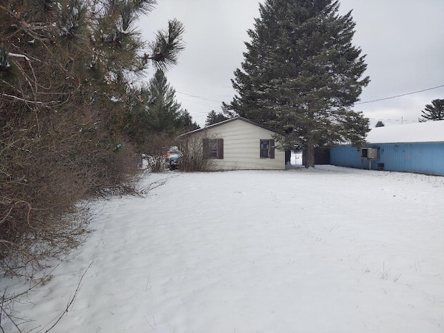 view of yard covered in snow