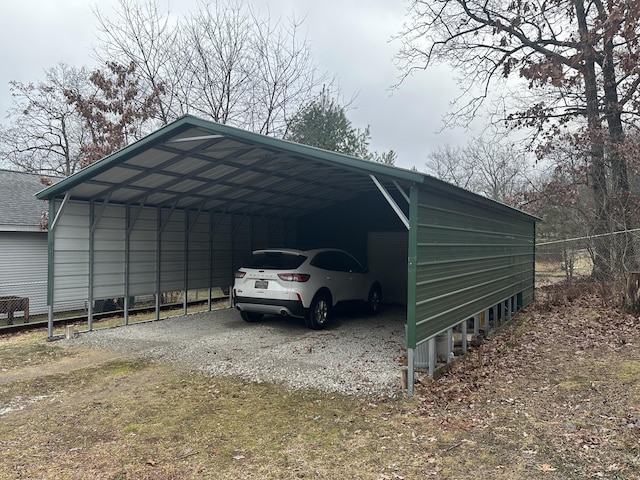 view of parking / parking lot with a carport