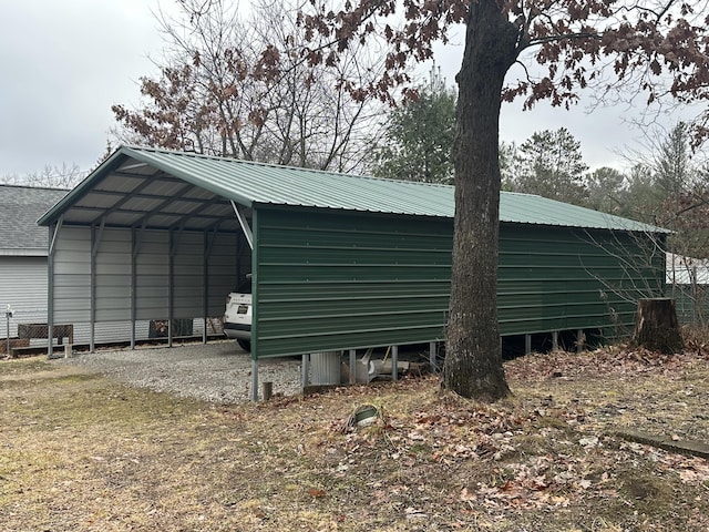 view of outbuilding featuring a carport