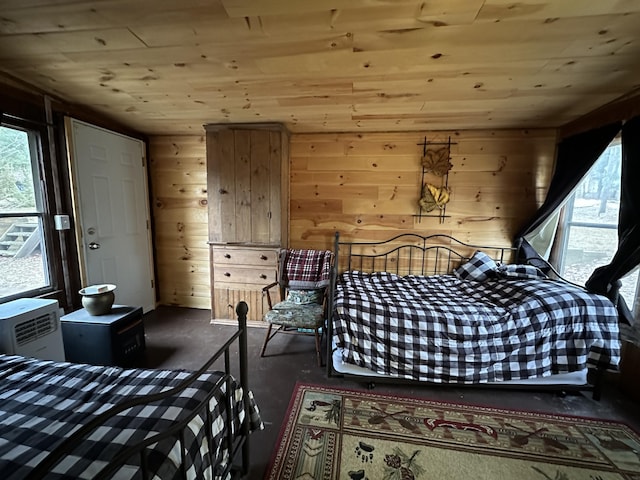 bedroom featuring wood walls and wood ceiling