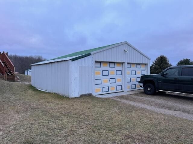 view of outdoor structure with a garage