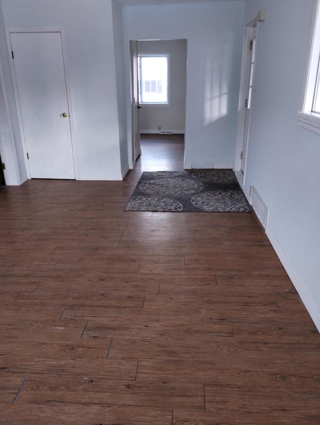 interior space featuring dark wood-type flooring