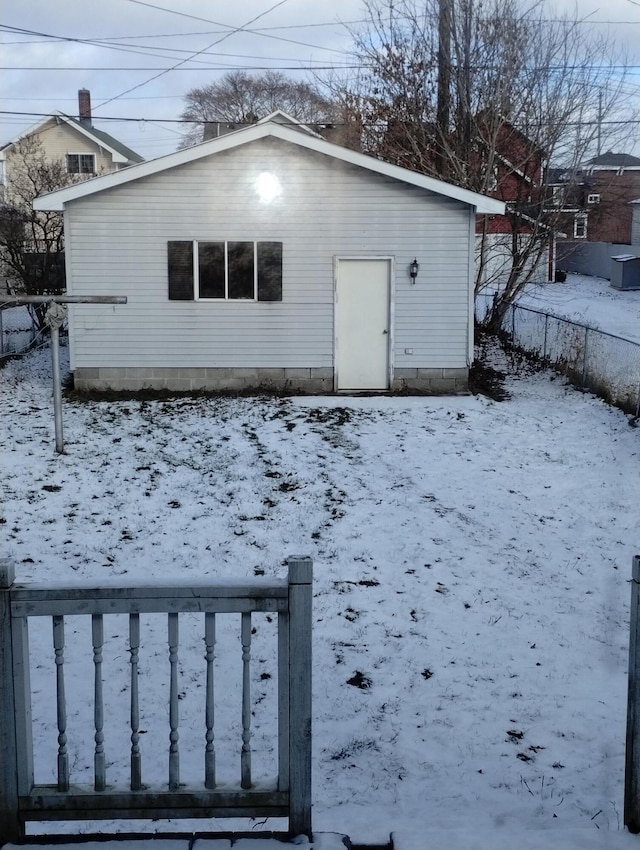 view of snow covered house