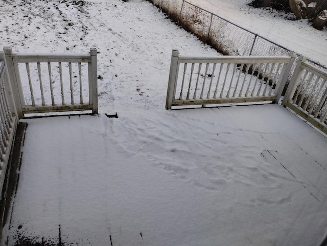 view of snow covered deck