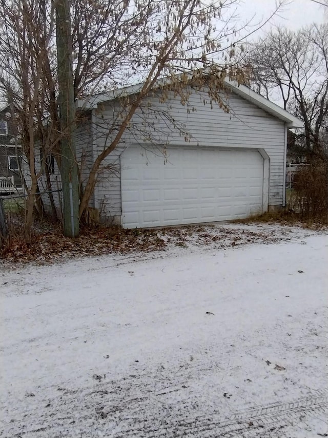 view of snow covered garage