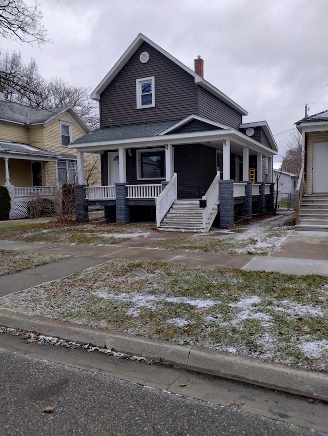 bungalow-style house featuring covered porch