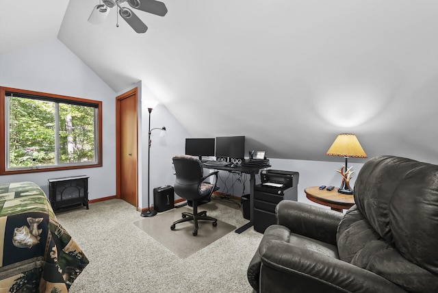 carpeted office with ceiling fan and lofted ceiling